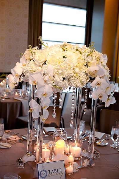 Clear Beautiful Wedding Centerpiece. Inside the glass you put battery powered tea lights Decoration Buffet, Beautiful Wedding Centerpiece, Pennsylvania Wedding, White Wedding Flowers, Flower Ideas, Wedding Dreams, Deco Table, Floral Centerpieces, Wedding Flower