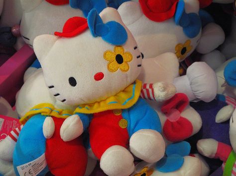 Kitty Clown, Hamleys Toy Shop, London Clown Stuffed Toy, Clown Room Aesthetic, Kidcore Plushies, Toy Shop Aesthetic, Clowncore Decor, Sanrio Clown, Cute Clown Aesthetic, Clown Theme Party, Clown Hello Kitty