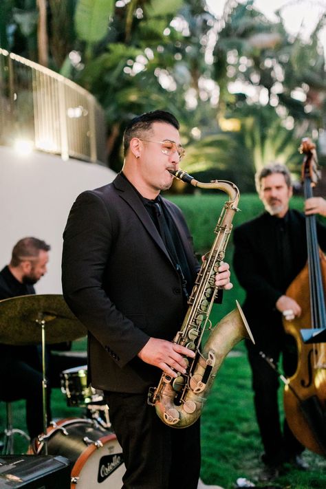 real wedding photo ritz carlton bacara santa barbara the hidden garden flowers jazz band saxophonist bassist playing at outdoor cocktail hour Jazz Wedding Reception, Band At Wedding Reception, Wedding Jazz Band, Jazz Band Wedding, Jazz Club Wedding, Cocktail Hour Photos, Wedding Orchestra, Wedding Band Music, Cocktail Party Wedding Reception