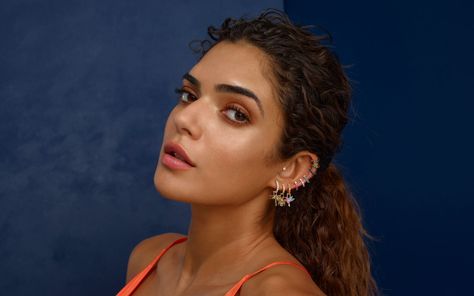 A model wears Robinson Pelham Orb Hoop earrings and EarWish charms with coloured gemstones and diamonds Robinson Pelham, Coloured Gemstones, Katerina Perez, Baby Jewelry, Gwyneth Paltrow, Butterfly Earrings, Link Necklace, The Scene, Pink Sapphire