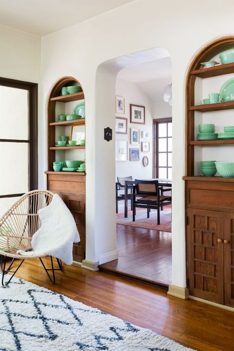 Arched Wall Built Ins, Historic Built Ins, Arched Windows Interior, Arched Built In Kitchen, Built In Shelves Around Doorway, Built In Cabinet With Arch, Cozy Built Ins, Arch Wall Built In, Archway Built Ins