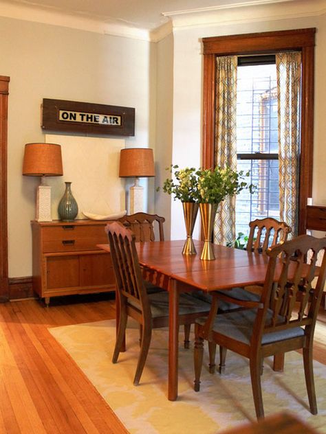 Maybe the place for the two-lamp +console table get-up is in the dining room. Cool Jobs, Painting Wood Trim, Natural Wood Trim, Dark Wood Trim, Vintage Apartment, Crown Moldings, Living Room Orange, Decorating Inspiration, Wood Trim