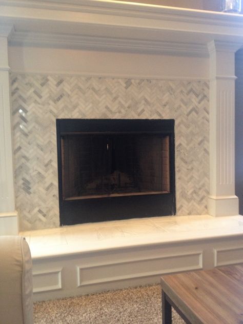 Chevron fireplace Fireplace Chevron, Chevron Fireplace, Kitchen 2023, Fireplace Redo, Diy Fireplace Makeover, Mantle Ideas, Chevron Tile, Tile Fireplace, Fireplace Tile Surround