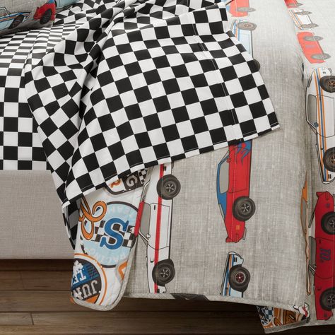 Complete with a checkered sheet set, this decorative quilt will provide the ultimate race car themed bedding for your child's bedroom. The fun graphic prints energize the room with many colors Start your engines and get ready to drive into dreamland! Car Toddler Room, Racing Bedroom, Boys Car Bedroom, Boy Car Room, Race Car Bedroom, Car Room Decor, Car Themed Bedrooms, Childrens Bedding Sets, Race Car Themes