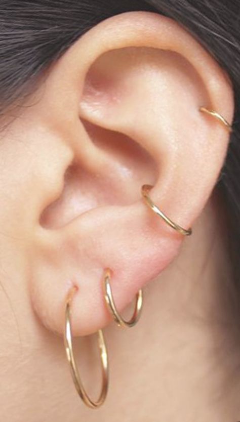 simple multiple ear piercing ideas for teens for women gold ring hoop earring conch cartilage helix for minimalists Piercing Simple, Piercing Snug, Women Gold Ring, Ear Peircings, Ear Piercings Chart, Ear Piercing Ideas, Double Ear Piercings, Piercing Conch, Multiple Ear Piercing