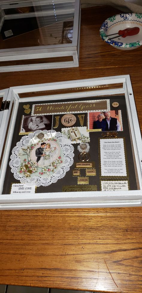 I created this shadow box using a gold color scheme to commemorate their 50 years together as husband and wife. Their Christian faith is the foundation of their marriage. Anniversary Shadow Box, Shadow Box Ideas, 50th Anniversary Gifts, Gold Color Scheme, 50th Wedding Anniversary, 50th Wedding, Box Ideas, Shadow Boxes, Husband And Wife