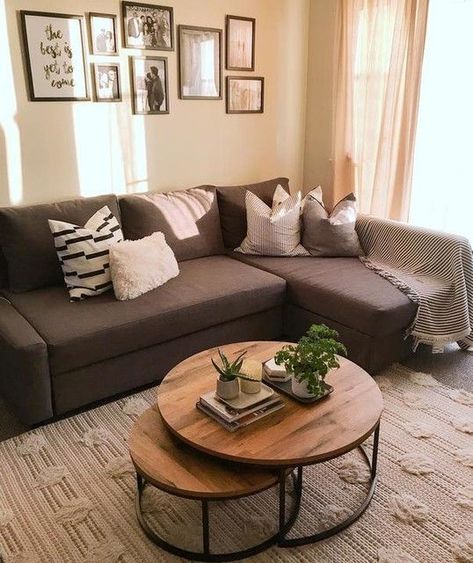 a farmhouse living room with a brown sectional, a duo of coffee tables, a black and white gallery wall is cool Brown Sofa Living Room, Living Room Decor Brown Couch, درج السلم, Couches Living, Brown Couch Living Room, Brown Living Room Decor, Real Homes, Small Living Room Decor, Brown Living Room