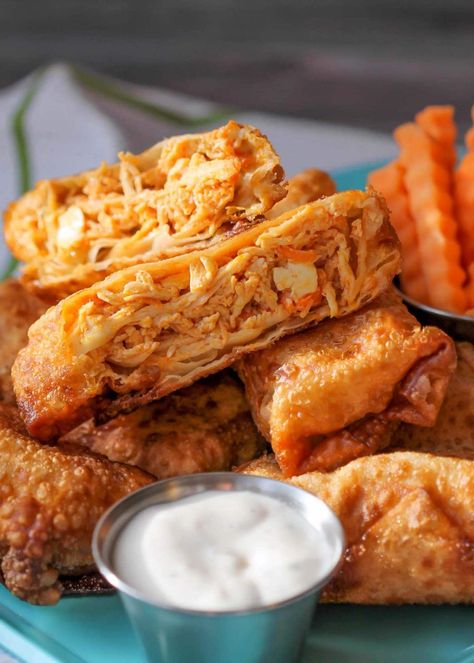 Buffalo Chicken Egg Rolls are two of our favorite appetizer recipes in all wrapped up into one dippable delight. Buffalo Chicken Egg Rolls, Reheat Chicken, Easy Buffalo Chicken, Chicken Egg Rolls, Chicken Spring Rolls, Egg Roll Recipes, Chicken Dips, Wontons, Buffalo Chicken Dip