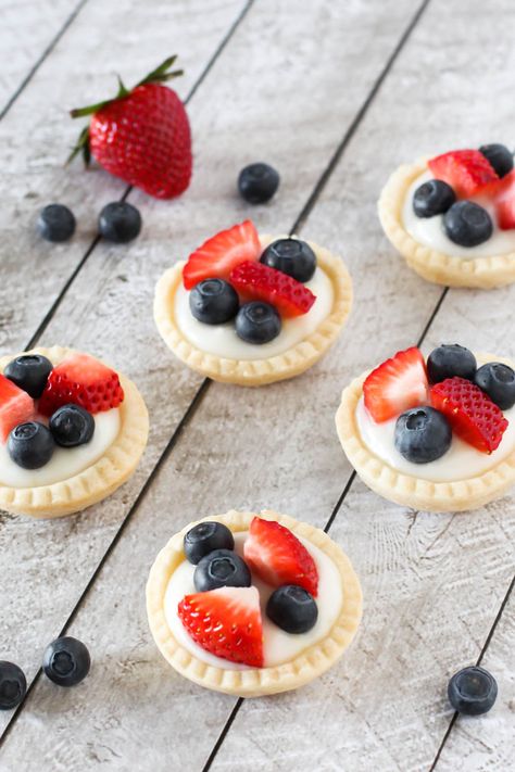 Gluten Free Vegan Mini Fresh Fruit Tarts. Light pastry, filled with lemon cream pudding and topped with fresh berries. A splendid spring dessert! Easter With Family, Fruit Tart Filling, Mini Fruit Tarts, Fresh Fruit Tart, Fruit Tart Recipe, Spring Dessert, Fruit Tarts, Spring Desserts, Free Fruit