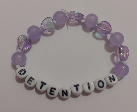 My detention inspired bracelet for the trilogy tour! (Not for trade)    Tags: #melaniemartinez #trilogytour #bracelets #handmade #portals #k12 #crybaby #extraclutterep #afterschoolep #aftershcool #extraclutter #dollhouseep #dollhouse #concert #melanie #mel #fairy #faerie #lyrics #songs #music #fairycore #necklace #ocean #sea #necklace #seaturtle #turtle #pink #blue #starfish #dolphin #necklacr Melanie Martinez Trilogy Tour Bracelets, Trilogy Tour Bracelets, Melanie Bracelet, Slytherin Accessories, Melanie Martinez Bracelet, Fairycore Necklace, Melanie Martinez Merch, Melanie Martinez Songs, Diy Kandi Bracelets