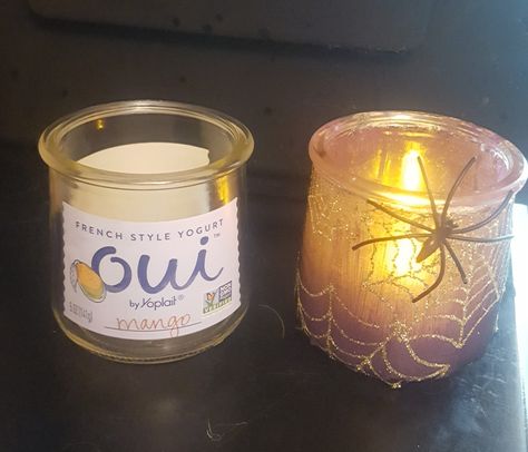 Oui jar now Halloween votive Oui Glass Jar Ideas, Halloween Oui Jars, Oui Yogurt Jars Ideas Halloween, Glass Jar Halloween Crafts, Oui Jars Repurpose Christmas, Rv Halloween, Jar Upcycle, Oui Jars, Decorating Candle Jars