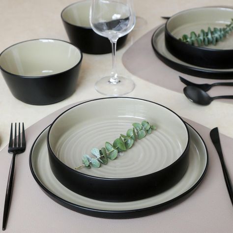 PRICES MAY VARY. Frame Your Food: Our Elica dinnerware set acts as the perfect canvas, enhancing and framing each dish's presentation, turning every meal into a masterpiece. Artistic Craftsmanship: Showcasing a sleek, modern aesthetic, each piece complements the colors and textures of your culinary creations. This 24-piece set includes 8 dinner plates (10.47in.), 8 dinner bowls (24 fl. oz., 8-inch) and 8 soup bowls (25 fl. oz.). Intricate Detailing: From sleek, modern edges to textured patternin Rimmed Plates, Black Dinnerware Set, Dinnerware Set Modern, Black Dinnerware, Plates And Bowls Set, Modern Dinnerware, Stoneware Dinnerware Sets, Beige Stone, Dinner Bowls