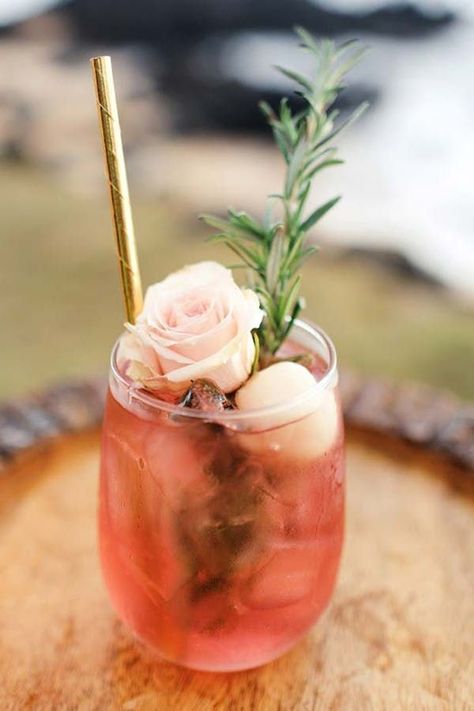 FLORAL COCKTAILS. 20 Stunning Tablescape Ideas for a Boho Wedding  #purewow #flowers #decor #wedding #weddingdecor #weddinginspiration #weddingtablescapes #bohoweddings #bohobrides #weddingdecorations #weddingtables #floralcocktails #weddingcocktails Boho Wedding Decor Ideas, Blackberry Wine, Boho Wedding Decor, Wedding Food Drink, Floral Cocktails, Wedding Decor Ideas, Tablescape Ideas, Pink Cocktail, Maui Wedding