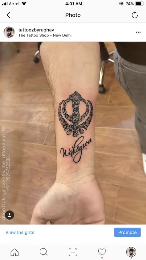 Waheguru khanda punjabi tattoo by Raghav Sethi. Waheguru Tattoo On Hand, Waheguru Tattoo Design, Punjabi Tattoo Men, Punjabi Tattoo Ideas Women, Khanda Tattoo Design, Khanda Tattoo, Punjabi Tattoo, Trible Tattoos, Guru Tattoo