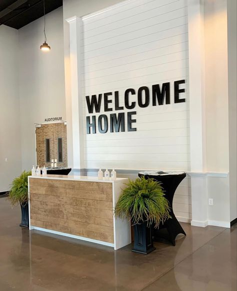 Business Entryway Ideas, Church Reception Desk, Christian Church Interior Design, Church Cafe Ideas, Church Foyer Decorating Ideas, Welcome Desk Church, Church Platform Decor Ideas, Church Signage Interior, Church Lobby Furniture