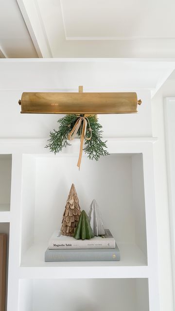 Christmas Decor Ideas For Light Fixtures, Christmas Garland On Light Fixture, Christmas Decor Floating Shelves, Christmas Decor On Light Fixtures, Dresser Christmas Decor, Cozy Holiday Decor, Neutral Holiday Decor, Picture Lights, Neutral Christmas