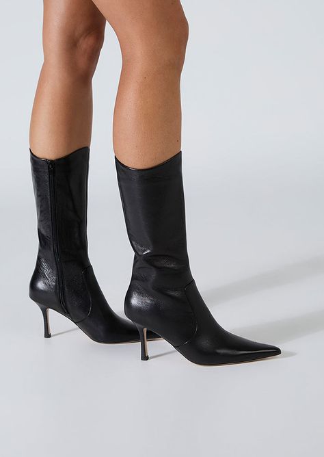 Sheba has a pointed toe and slender heel, creating a sleek silhouette, exuding timeless grace. The distinctive curved opening adds a touch of modernity, making these boots a stand out choice for any occasion. Crafted with precision and style, these calf boots will effortlessly elevate your look. -Material: Leather -Sole: Man-Made -Fit: True to Size -Toe-shape: Point -Features: Curved Opening -Heel: 8cm Leg Height x Calf Circumference x Opening Circumference 5 - 269mm x 318mm x 318mm 5.5 - 273mm Point Toed Boots, Pointed Boots Outfit, Mid Calf Boots Outfit, Calf Boots Outfit, Black Stiletto Boots, Heels Boots Outfit, Pointy Boots, Thigh High Boots Flat, Fall Heels