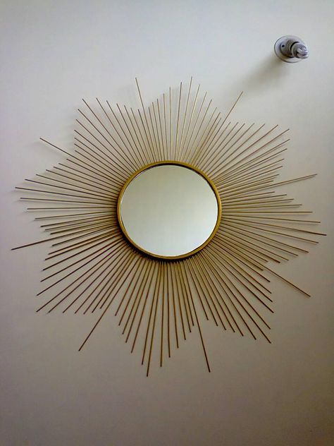 A sun brust mirror created with bamboo sticks and hardboard Bamboo Sticks Crafts Wall Art, Bamboo Sticks Crafts, Bamboo Sticks Decor, Sticks Crafts, Gifts Boxes, Bamboo Crafts, Diy Bottle Crafts, Diy Cookie, Frameless Mirror