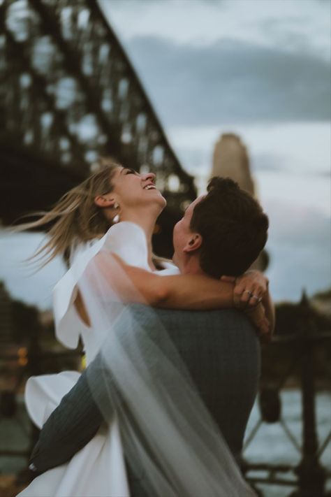 Bride and groom dancing outside with Sydney Harbour bridge in background. Long exposure photography, candid moment showing emotions. Couple is laughing. Wedding Dancing, Dark Edit, City Wedding Photos, Dancing Couple, Cute Engagement Photos, Couple Engagement Pictures, City Engagement Photos, Engagement Pictures Poses, Sydney City