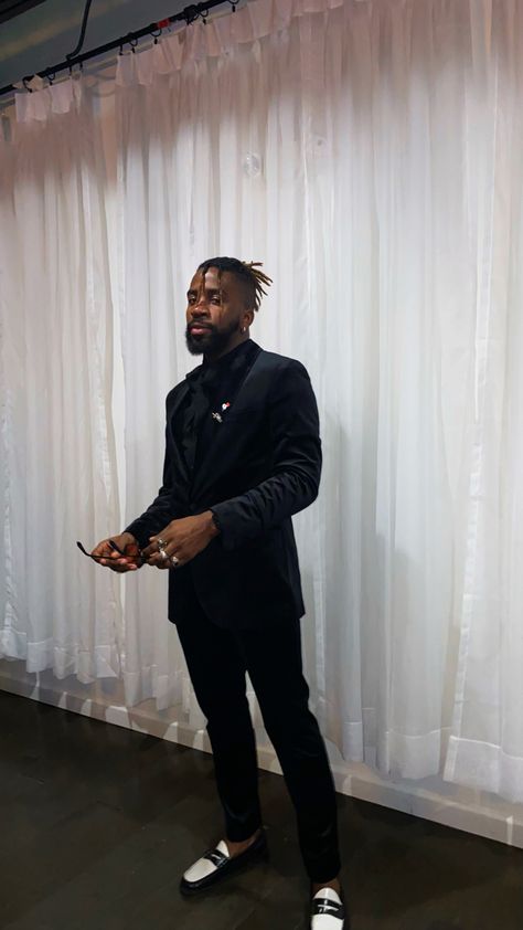 Black velvet smoking jacket with matching pants Black and white loafers Black man with locs tied in a back ponytail Black And White Loafers Outfit Men, White Loafers Men, White Loafers Outfit, Black And White Loafers, Man With Locs, Loafers Men Outfit, Back Ponytail, White Loafers, Loafers Outfit