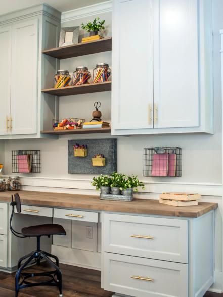 The built-in cabinets provide plenty of space for storing and organizing tools and craft supplies in the craft room, as seen on Fixer Upper. Kitchen Work Space, Kitchen Desk Areas, Organization Desk, Fixer Upper Kitchen, Desk Kitchen, Kitchen Desks, Office Nook, Desk Areas, Kitchen Counters