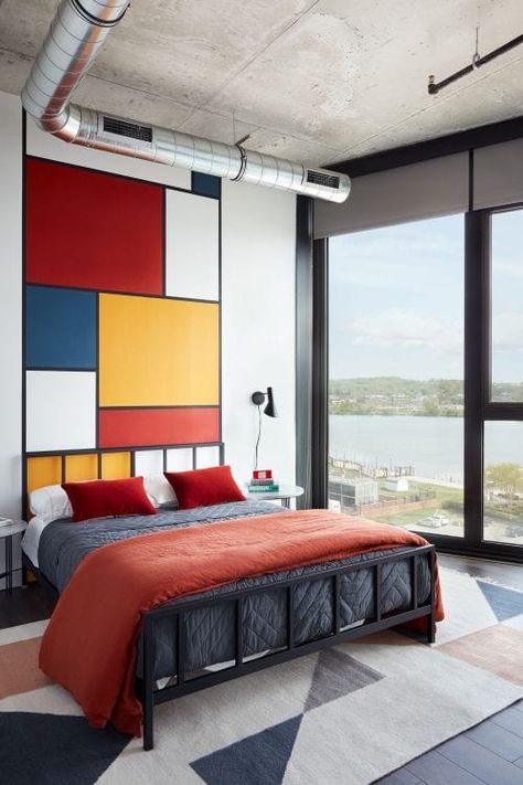 Floor-to-ceiling windows let in ample natural light and amazing river views. Bauhaus Design Interior, Bauhaus Bedroom, Bauhaus Interior Design, Bauhaus Interior, Bauhaus Architecture, Modern Style Furniture, The Guild, Bedroom Bliss, Live In Style