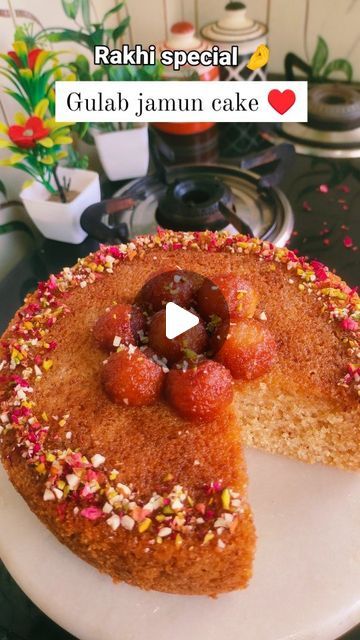 Raksha Jain on Instagram: "Gulab jamun cake ♥️ guys u need to try this out ♥️🤌 #reelsinstagram #reelkarofeelkaro #reelsvideo #rakshabandhan #gulabjamun #cake #eggless #recipe #dessert  If you love gulab jamun then you need to try this delightful and so so delicious Gulab jamun cake.. Please check the ingredients below 👇  🤌..1 cup suji  🤌..1/2 Cup nuts of your choice  🤌.. 1 tablespoon elaichi / cardamom  🌟Take a mixer and make a Fine powder  🤌..12 tbsp /3/4th cup powder sugar  🤌..1/2 Cup oil 🤌..1+1/2 Cup little bit warm milk (atleast take room temperature) 🌟 Mix both ingredients really well for at least three to four minutes  🤌.. prepared Suchi mixture  🤌.. one cup of gulab jamun 🌟( premix which you can easily get from any grocery store) ( I have added MTR Gulab jamun premix ) Gulab Jamun Cake Recipe, Gulab Jamun Cake, Gulab Jamun Recipe, Jamun Recipe, Powder Sugar, Gulab Jamun, Recipe Dessert, Videos Cooking, Warm Milk