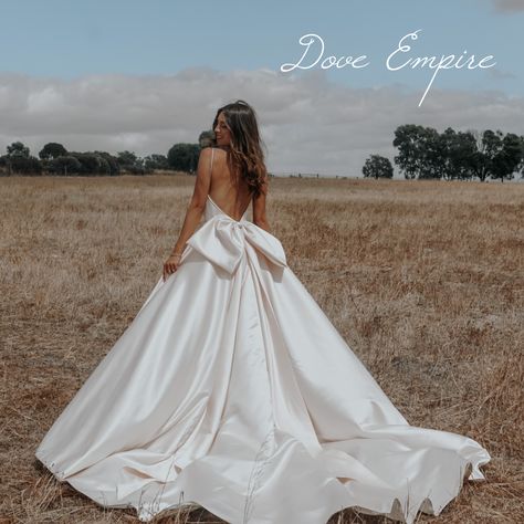 Subtle Princess Wedding Dresses, Wedding Dress Large Bow On Back, Wedding Dress With Front Bow, Simple Elegant Wedding Dress With Bow, Backless Princess Wedding Dresses, Bridal Gown With Bow, Unique Classic Wedding Dress, Silk Bow Wedding Dress, Elegant Wedding Dress Backless