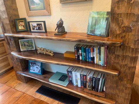 Rustic built in cedar shelves Rustic Built In Shelves, Rustic Built In Bookshelves, Rustic Bookshelf Ideas, Wooden Cubby Shelf, Cedar Shelves, Bookshelves Living Room, Country Bathrooms, Low Bookshelves, Wooden Cubby