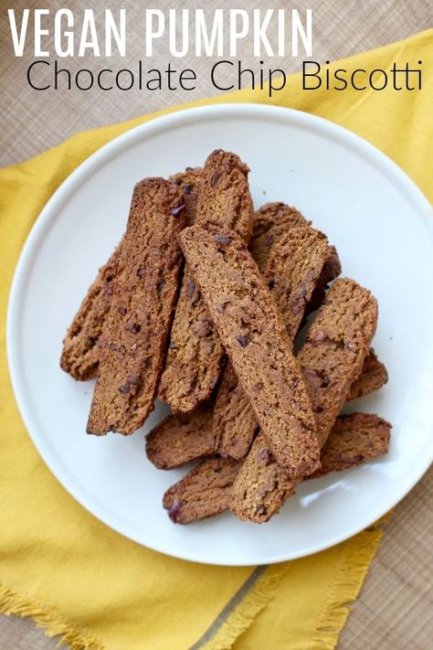 Vegan Pumpkin Chocolate Chip Biscotti! This easy biscotti recipe is sweet and full of warming pumpkin spices. It's the perfect dessert for this fall season. Studded with chocolate chips, it's definitely a crowd pleaser! #vegan #veganbiscotti #pumpkin #Pumpkinspice #pumpkinbiscotti #chocolate #thanksgiving Easy Biscotti, Chocolate Chip Biscotti, Easy Biscotti Recipe, Vegan Thanksgiving Menu, Pumpkin Biscotti, Easy Vegan Cookies, Pumpkin Spices, Vegan Chocolate Recipes, Vegan Gluten Free Desserts