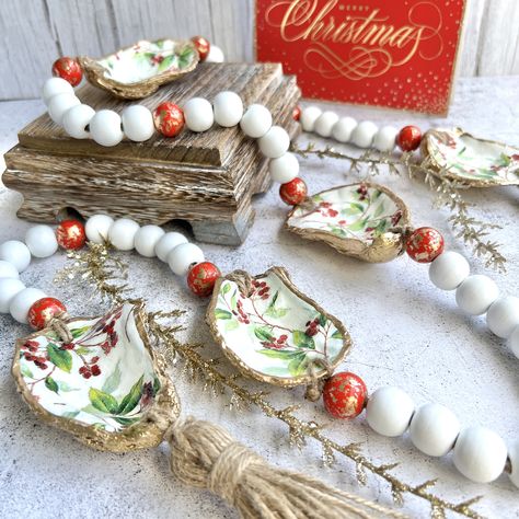 Gilded Shells, Painting Oyster Shells Diy Christmas, Grinch Oyster Shell Ornament, Oyster Shell Garland, Oyster Ideas, Angel Oyster Shell Ornament, Santa Oyster Shell Ornament, Christmas Tree Topiary, Oyster Shell Crafts Wreaths & Garlands