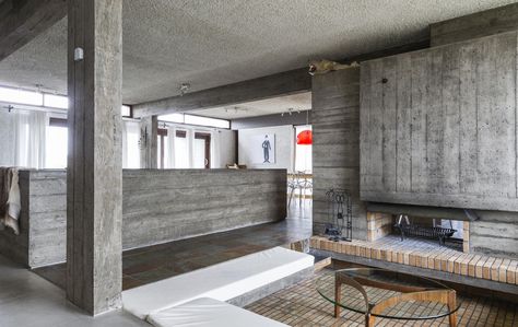 Brutalist house by Iceland’s first female architect hits the market Brutalist House, Brutalist Interior, Concrete Fireplace, Freestanding Fireplace, Concrete Bricks, Clerestory Windows, Built In Furniture, Brutalist Architecture, Interior Architect