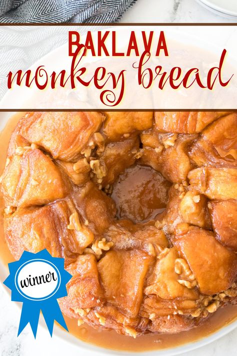 Baklava Monkey Bread is a delicious twist on two classic treats. Sweet, sticky flavors of baklava combined with the pull-apart fun of monkey bread makes it perfect for sharing. This recipe is easy to make and uses simple ingredients for a dessert that feels special but isn't complicated. Shareable Desserts, Savory Monkey Bread, Easy Monkey Bread, Cinnamon Roll Monkey Bread, Recipes For Bread, Bread Winners, Homemade Bread Recipes, Biscuit Rolls, Bread Breakfast