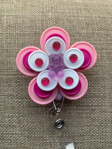 Made from medication vial tops. I can make custom ones if you let me know what you would like! This one is on a slide clip Nurse Badge Holders, Top Crafts, Name Badges, Gummy Bear, Nurse Badge, Gummy Bears, Badge Holder, Id Holder, Id Badge