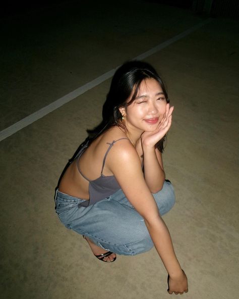 tags: #asiangirl #poseinspo #photoshoot #shorthair #bob #goldjewelry #baggyjeans #backlesstop #heels #streetwear #parkinggarage #vintage #aesthetic #coquette #thrift Squating Down Pose, Coquette Thrift, Squat Pose, Aesthetic Coquette, Backless Top, Vintage Aesthetic, Baggy Jeans, Short Hair Styles, Rice