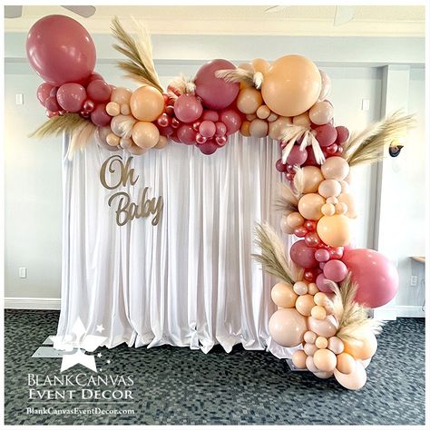 Boho Organic Balloon Garland with Pampas Grass on White Drape Backdrop wth Oh Baby Sign in Indian Harbor Beach FL Sheer Backdrop With Balloon Garland, Grass And Balloon Backdrop, Curtain Backdrop With Balloons, Balloon Garland With Pampas, Curtain Balloon Backdrop, Balloon Arch With Pampas, Garland With Pampas, White Drape Backdrop, Boho Balloon Garland Backdrop