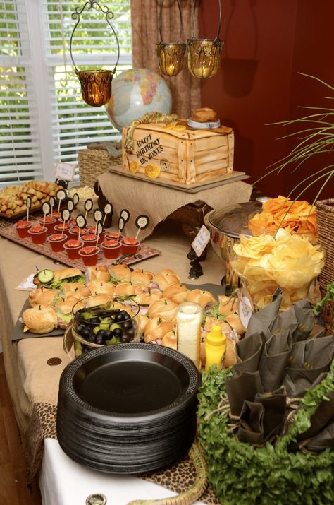 Indiana Jones: Party food featuring Bettle Wings, Chilled monkey brain, mummy dogs, snake subs, & mine cart meatballs. Yum!!! Jumanji Party, Dodgers Birthday Party, Indiana Jones Birthday Party, Indiana Jones Party, Explorer Party, Vbs Snacks, Monkey Brain, Mine Cart, Detective Party