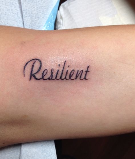 Resilient arm tattoo Resilient Word Tattoo, Resilient Tattoo Ideas, Resilient Tattoo, Resilience Tattoo, Wrist Tattoos Words, Tattoos Pinterest, Omerta Tattoo, Healing Tattoo, Incredible Tattoos