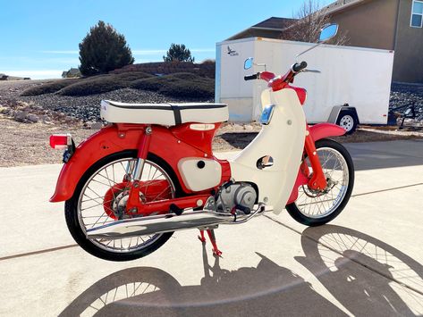 1965 Honda Step Through 50 Model C100. 3 spd auto clutch 4.5 HP top speed 42 MPH. Honda C100, Vintage Honda Motorcycles, Honda Cub, Japanese Motorcycle, Honda Motorcycles, Classic Bikes, Year 2000, Vintage Motorcycles, Vintage Japanese