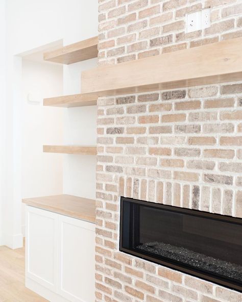 brick fireplace • Instagram Limewash Brick Fireplace, Brick Fireplace Modern, Whitewash Brick Fireplace, Whitewash Brick, White Wash Brick Fireplace, Wood Mantle Fireplace, White Brick Fireplace, Wood Mantle, Linear Fireplace