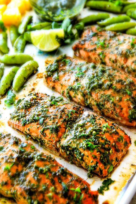 Easy SHEET PAN Asian Chimichurri Salmon is the most tender, flavorful salmon you will ever make - no joke! all cooked with pineapple and snap peas for a complete meal-in-one! An easy, satisfying dinner that tastes totally gourmet! Salmon And Chimichurri, Salmon Chimichurri Recipe, Salmon Chimichurri, Chimichurri Fish, Sheet Pan Asian, Chimichurri Salmon, Salmon Meals, Seafood Entree, Argentinian Food