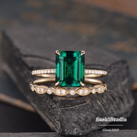 10x8mm Lab Emerald Engagement Ring Solitaire Yellow Gold Ring Bridal Set Wedding Women Anniversary Gift For Her Birthstone May Simple ITEM INFORMATION: Metal Type- Solid 14K Rose Gold WIDTH- ( approx. 1.5mm) **Engagement Ring** Center Stone- 8*10mm Emerald Cut Lab Emerald Side Stone- Natural Diamond Weight- 0.15ct Color- H Clarity- SI **Wedding Band** Band Width: 2.3mm  Stone- Natural Diamond Weight- 0.13ct Color- H Clarity- SI **Stone Replacement** Available with any other gemstones, please feel free to contact me for a quote. **Metal Type** Available in 14K or 18K yellow gold, white gold, and rose gold. Please select from the drop down menu. **Production Time& Rush Order** Our standard production time is 2-3 weeks from time of purchase. I am very happy to provide rush order service, the Luxury Octagon Emerald Ring As A Gift, Lab Created Emerald Ring, Luxury Green Princess Cut Wedding And Engagement Ring, Luxury Yellow Gold Emerald Ring, Emerald Gold Band Engagement Ring, Luxury Pear-shaped Emerald Promise Ring, Emerald Color Engagement Ring, Gold Emerald Engagement Ring Green, Wedding Rings Engagement Emerald