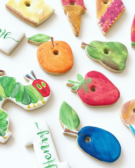 Very Hungry Caterpillar cookies from Henry’s 1st Birthday 🍎🍐🍓🍉🍦🥧🧀 Hungry Caterpillar Cookies, Caterpillar Cookies, Painted Cookies, Hungry Caterpillar Birthday, Gifts Creative, Paint Cookies, One Smart Cookie, 2nd Birthday Party Themes, Cake Blog