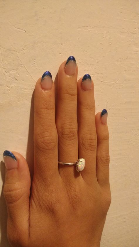 Almond shape nail extension with navy blue french tip and silver glitter lining Navy Blue French Tips, Navy And Silver Nails, Blue French Tip, Glitter French Tips, Blue French Tips, Almond Shape Nails, Blue French, Nail Idea, Almond Shape