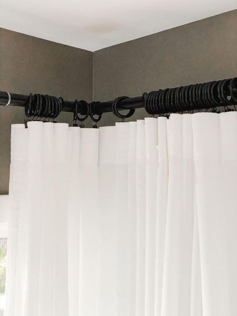 Today I am sharing my favorite inexpensive white curtains, the IKEA Ritva Curtains and how I hung them on a corner curtain rod to accommodate the corner windows I have in my home. Ikea Ritva Curtains, Ritva Curtains, Guest Room Paint, Corner Curtain Rod, Corner Windows, Corner Curtains, Bay Window Curtain Rod, Black Curtain Rods, Bedroom Ideas For Small Rooms Cozy