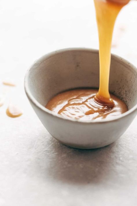 Magic Vegan Caramel Sauce made with coconut oil, real maple syrup, and almond butter. Microwave for one minute. SO GOOD! #dessert #sugarfree #vegan #sauce #dessertrecipe | pinchofyum.com Vegan Caramel Sauce, Vegan Sauce, Vegan Caramel, Coconut Almond, Decadent Cakes, Caramel Sauce, Free Desserts, Almond Butter, Vegan Desserts