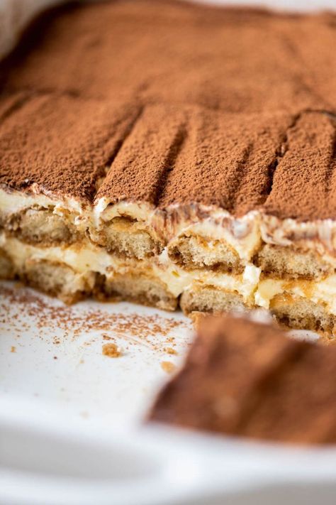 A baking dish of classic tiramisu. A few slices are missing from the front. Suzy Q Cake Recipe, Cheesecake Factory Pumpkin Cheesecake, Shavuot Recipes, Best Tiramisu Recipe, Best Tiramisu, Live Well Bake Often, Homemade Tiramisu, Classic Tiramisu, Tuna Melt Recipe