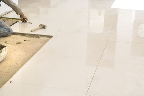 Here's a look at the inherent advantages and disadvantages of using porcelain flooring tiles in a variety of architectural applications. Porcelain Vs Ceramic Tile, Porcelain Tiles Kitchen, Porcelain Tile Bathroom, Marble Tile Bathroom, Residential Flooring, Ceramic Floor Tile, Polished Porcelain Tiles, Tile Covers, Floor Tile Design