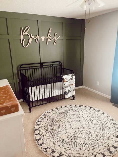 #nursery #baby #boardandbattenwall #rug #brooks Baby Boy Nursery Green Accent Wall, Accent Wall Boy Nursery, Baby Boy Nursery Name Sign, Baby Boy Nursery Themes Rustic, Accent Wall Nursery Boy, Olive Green Nursery Boy, Nursery Accent Wall Boy, Boy Nursery Ideas Rustic, Board And Batten Nursery Wall