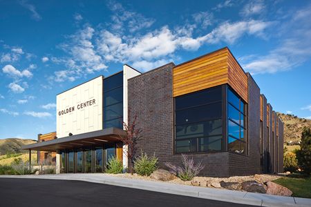 The Golden Center at Canyon Point - View from Entry Drive,.  Liked: windows, wood, and multi-element exterior, asymmetric shape Market Exterior, Spa Exterior, Orthodontic Office Design, Development Architecture, Storefront Windows, Office Exterior, Mall Facade, Church Building Design, Metal Building Designs